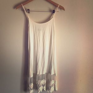 White under garment with lace skirting.